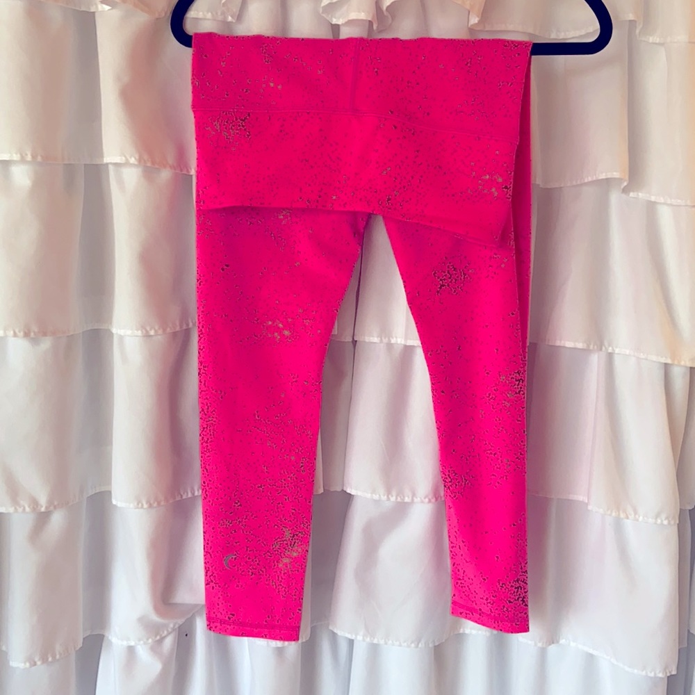 Zyia hot pink and gold splatter leggings.